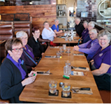 TAG members having coffee and snacks